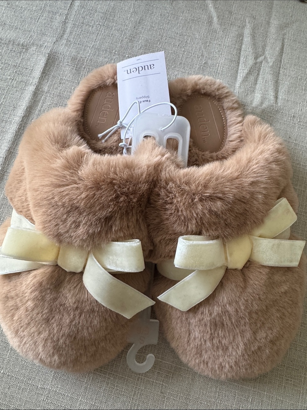 Auden Plush Bow Slip-Ons in Beige
